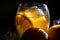 Dark photography of orange juice on clear glass over black background.