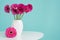 Dark pink gerberas in a vase on a retro table. Happy Mother`s Day, Women`s Day, Valentine`s Day or Birthday background.