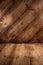 Dark plank wood floor and wall background.