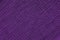 Dark purple crinkled fabric background texture