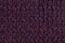 Dark purple knitted woolen background with a pattern of soft, fleecy cloth. Texture of textile closeup.