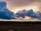 Dark, rainy clouds above the plain.