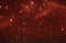 Dark red brown shiny abstract background with outer space. Twinkling star glow effect background.