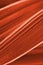 Dark red orange tinted floral background. Striped leaf of reed canary grass close-up. Natural texture. Backdrop or wallpaper from