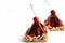 Dark red sweet cherry pyramid desserts with nuts on white chocolate matcha tea popcorn bases