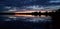 Dark reflective sunset on a prairie lake