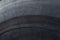 Dark rubber texture background scratch tire side close-up