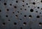 Dark Rustic Metal Panel With Round Holes, Generated with AI