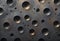 Dark Rustic Metal Panel With Round Holes, Generative AI