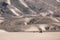 Dark sand dunes inside Mount Bromo volcano caldera, Java