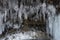 Dark and scary icicles in the a cave.