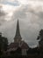 Dark scene with church on rainy overcast day england