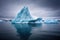 dark sea waters with ominous shaped iceberg