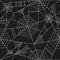 Dark seamless pattern with spiders cobweb.