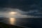 Dark seascape with stormy clouds at sunset