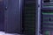 Dark server room of modern data center storage with blue lights