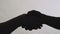 Dark silhouette of business handshake