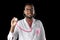 Dark skin doctor with pink stethoscope