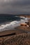 Dark sky and churning surf