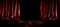 Dark stage scene with red curtain