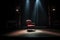 dark stage with spotlight on a single empty chair