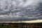 Dark storm clouds over a city