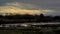 Dark storm clouds over the marsh in the flemish countryside