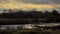 Dark storm clouds over the marsh in the flemish countryside