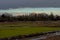 Dark storm clouds over the marsh in the flemish countryside