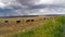 Dark storm clouds thunder across the plains of Arizona