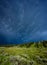 Dark and stormy clouds over Green hills