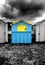 Dark stormy skies over beach hut UK