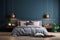 Dark style bedroom with a striking dark blue wall, a design mockup