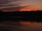 Dark sunset on river Adda