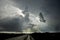 Dark thunder clouds and dramatic storms fill the sky over the sw