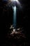 Dark, Underwater Grotto and Beam of Light