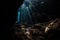 Dark, Underwater Grotto and Beams of Sunlight