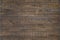 dark varnished wooden plank background with black metal trim