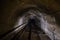 Dark vaulted underground urban sewer tunnel system