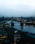 Dark view of Thames and London Bridge, dark days ahead for UK economy