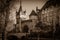 Dark view of Vajdahunyad castle, one of the romantic castles in Budapest, Hungary, located in the City Park by the boating lake /