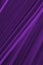 Dark violet floral background. Striped leaf of reed canary grass close-up. Deep purple tinted backdrop or wallpaper from plant