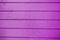 Dark violet horizon strips line wooden background