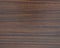 Dark walnut, natural wood grain with hacky black veins, close-up flat surface