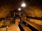 Dark wine cellar with tables