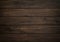 Dark wood background. Wooden board texture. Structure of natural plank