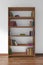 Dark wood bookcase with many different books