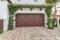 Dark wood side-hinged double garage doors at La Jolla, California