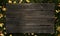 Dark wooden dusty boards on the grass frame texture