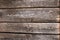 Dark wooden table surface background with wood texture and gaps between planks